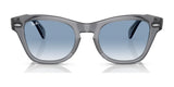 Ray-Ban RB0707S sunglasses with blue-tinted polar lenses and an acetate frame are elegantly displayed against a white background.