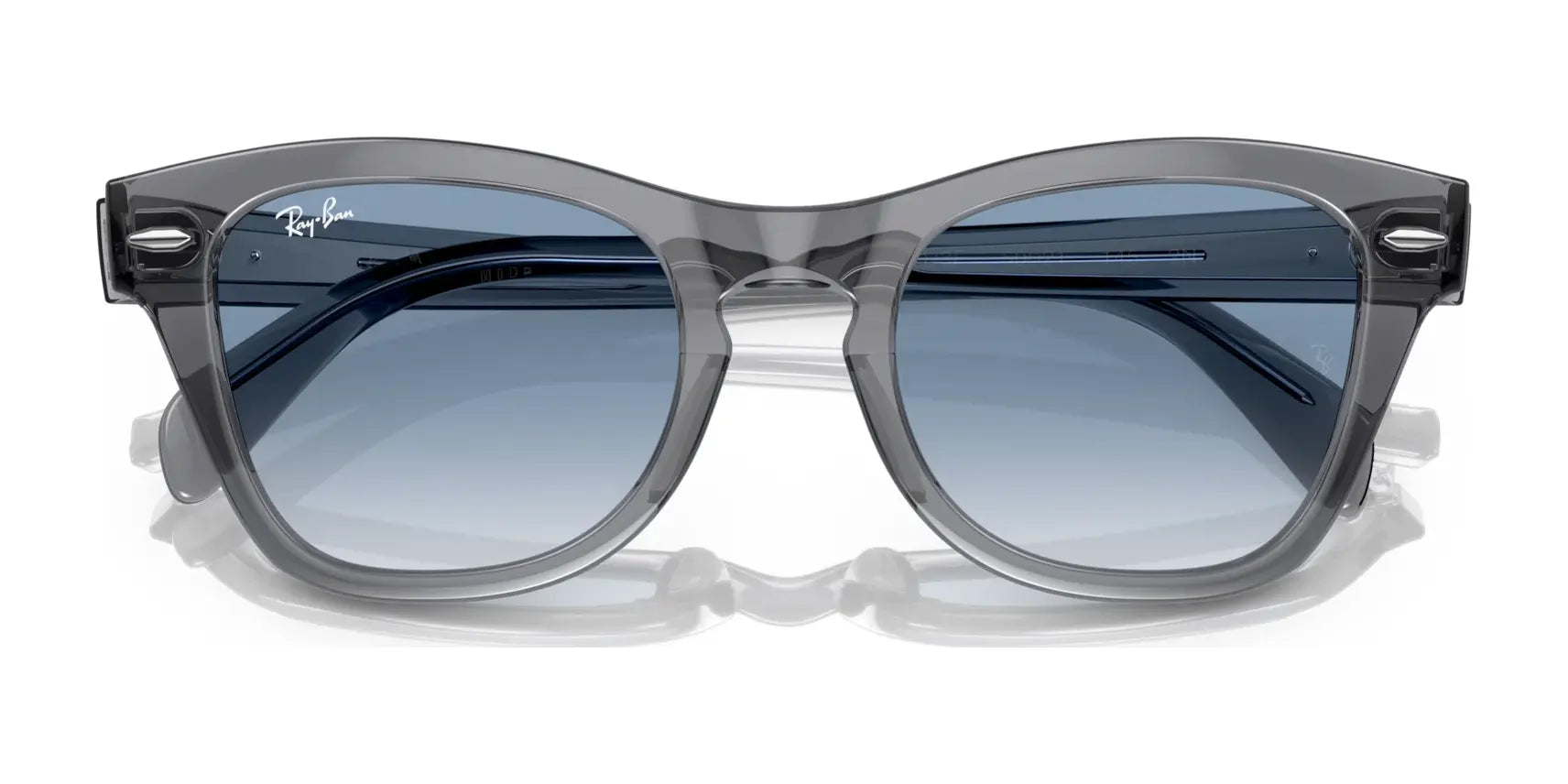 Ray-Ban RB0707S sunglasses, with an acetate frame and blue-tinted lenses, rest stylishly on a white background.