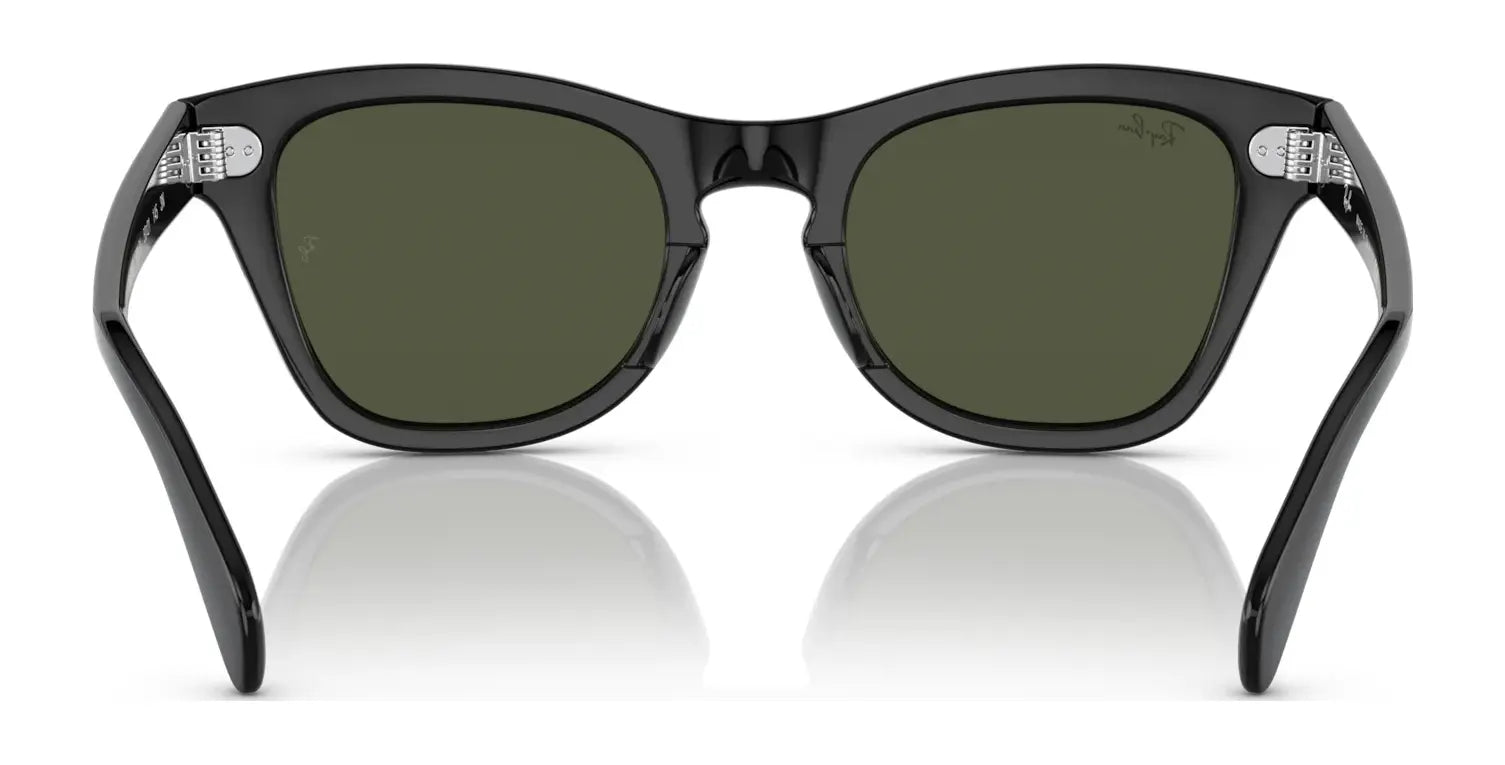 Rear view of Ray-Ban RB0707S sunglasses with a sleek acetate frame and green-tinted polarized lenses, beautifully reflecting on a white surface.