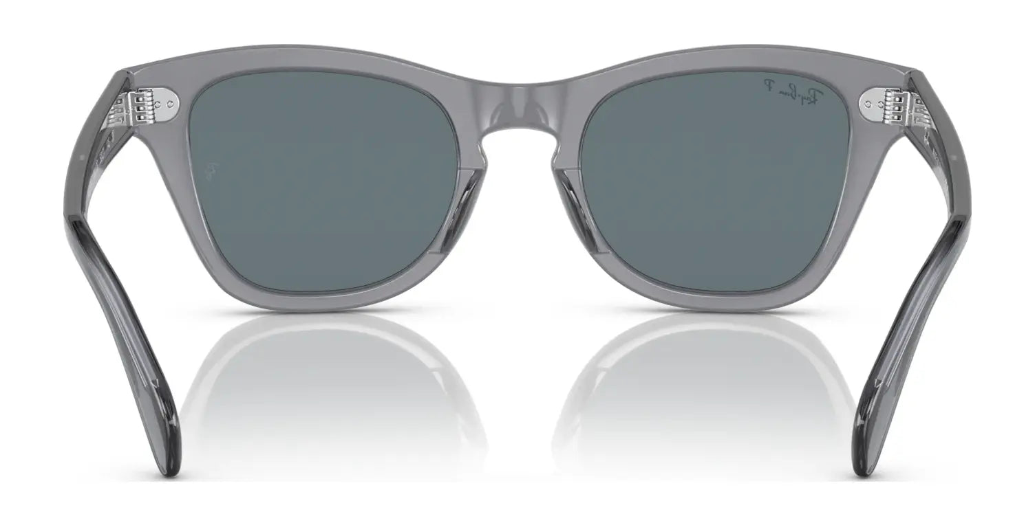 The Ray-Ban RB0707SF Sunglasses in size 53 boast a sleek gray design with dark lenses for top-notch style and UV protection, showcased from the back against a white backdrop.