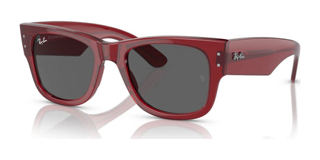 These oversized sunglasses boast a bold red frame and dark lenses, echoing the iconic Ray-Ban MEGA WAYFARER RB0840SF, highlighted against a crisp white background.