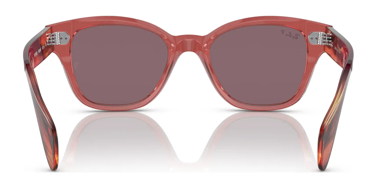 The Ray-Ban RB0880S sunglasses feature red square frames and tinted lenses providing UV protection, accented with a slight reflection on a white background.