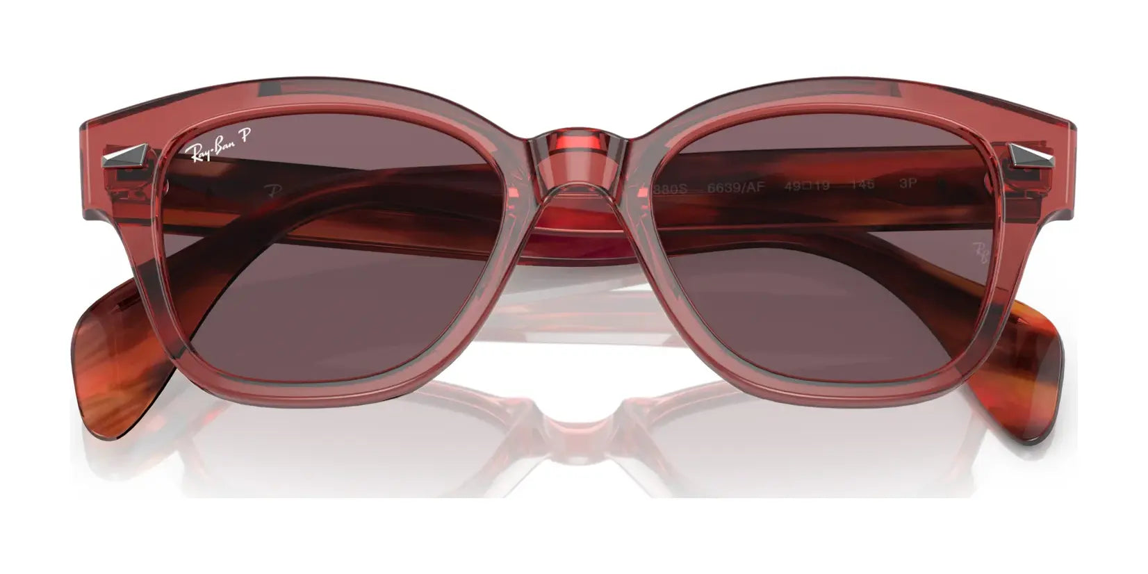 Try the Ray-Ban RB0880S Sunglasses with stylish red square frames and dark lenses, offering UV protection and a chic reflective surface.