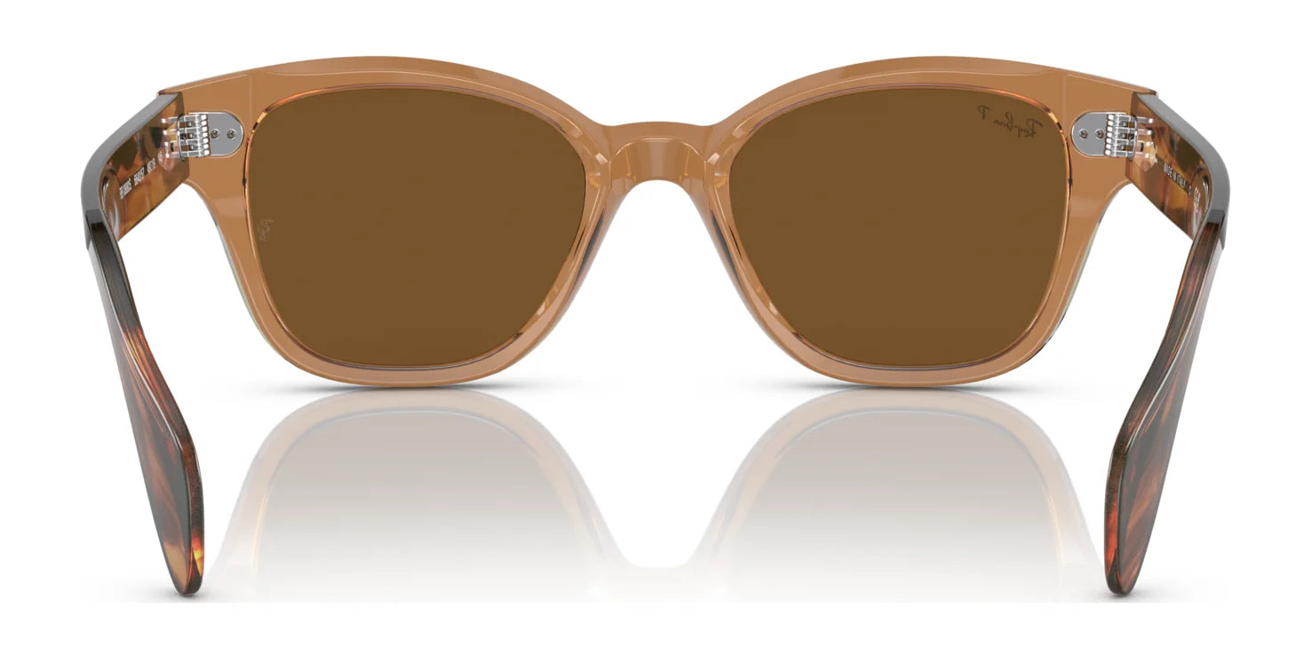 The Ray-Ban RB0880S Sunglasses showcase a square frame with tan coloring, brown lenses, and reflective arms for front-facing style and UV protection.