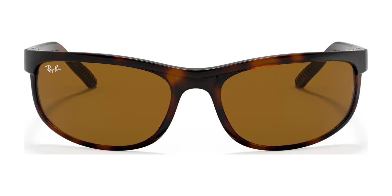 Discover timeless style with Ray-Ban PREDATOR 2 RB2027 Sunglasses. Featuring brown lenses and a dark tortoiseshell wraparound frame, these shades offer optimal UV protection while blending fashion with function against a pristine white backdrop.