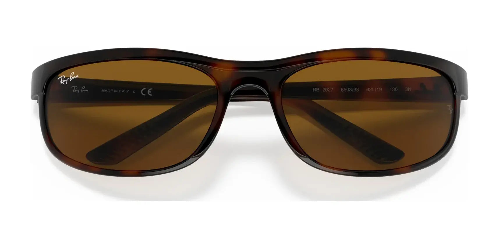 The Ray-Ban PREDATOR 2 RB2027 sunglasses, size 62, come in brown with a sleek wraparound frame and dark tinted lenses, providing stylish UV protection from harmful sun rays.