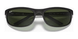 Sleek Ray-Ban PREDATOR 2 RB2027 sunglasses with a wraparound frame and dark green lenses, providing optimal UV protection, showcased on a pristine white background.