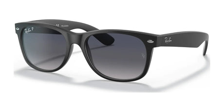 Experience the timeless appeal of Ray-Ban with the NEW WAYFARER RB2132 Sunglasses, size 52. The black frames coupled with dark lenses ensure optimal sun protection and create a stunning contrast against any white background.