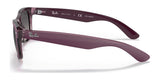 Side view of purple Ray-Ban NEW WAYFARER RB2132 sunglasses, size 58, with polarized lenses offering UV protection and "Made in Italy" on the arms.