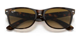 Ray-Ban NEW WAYFARER RB2132 Sunglasses in tortoise shell with brown lenses deliver stylish sun protection, featuring the iconic Ray-Ban logo at the top corner for a classic touch.