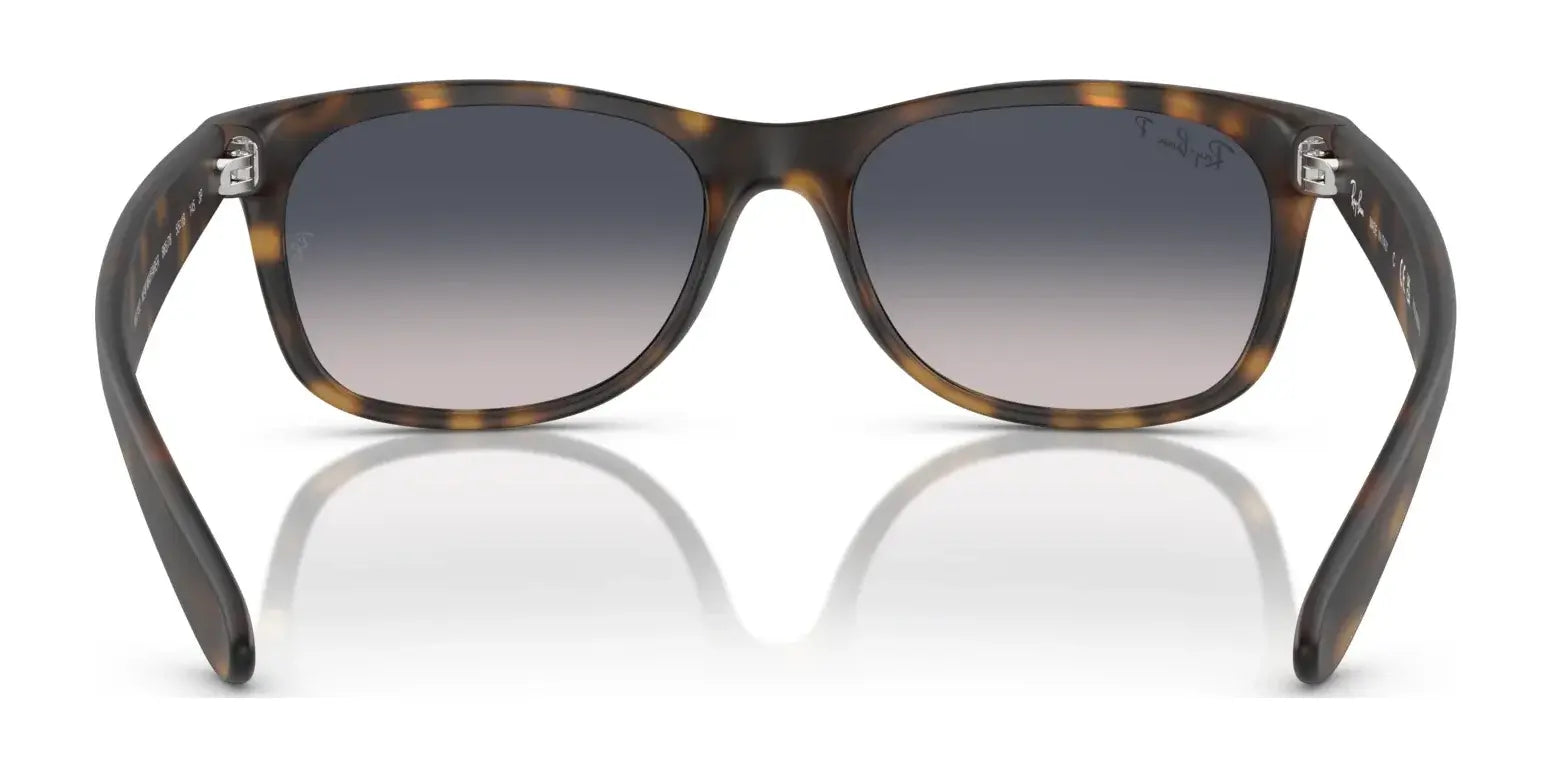 These Ray-Ban NEW WAYFARER RB2132 tortoiseshell sunglasses in size 58 offer dark gradient lenses with 100% UV protection.