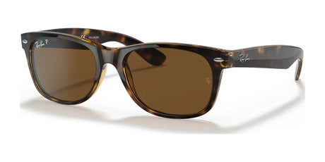 The Ray-Ban NEW WAYFARER RB2132 sunglasses in size 55 feature tortoiseshell frames, brown polarized lenses, and silver arm accents for excellent UV protection on sunny days.