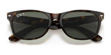 Close-up of chic Ray-Ban NEW WAYFARER RB2132 tortoiseshell sunglasses in size 58, with dark lenses, a prominent logo on the lens, and offering reliable UV protection.