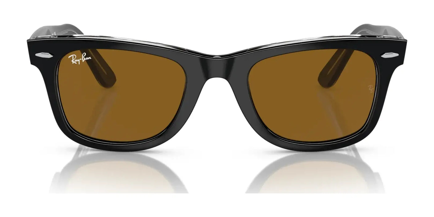 The Ray-Ban WAYFARER RB2140F Sunglasses feature a sleek, classic design with black frames and brown lenses, crafted from durable acetate to ensure longevity. Enjoy the signature style of Ray-Ban Wayfarer while benefiting from essential UV protection.