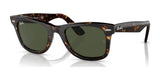 Ray-Ban WAYFARER RB2140F sunglasses in Havana №135931 with dark green lenses rest elegantly on a reflective surface, providing sleek UV protection for any sunny day.