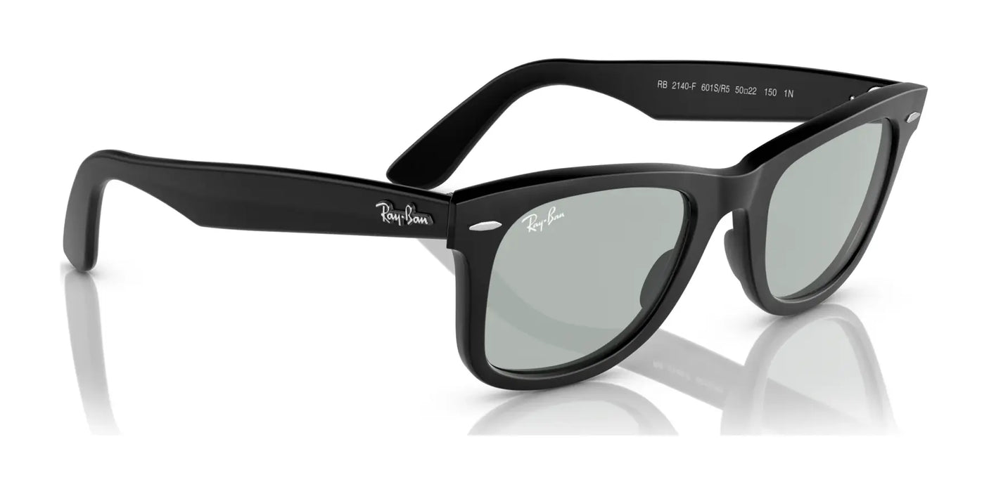 The Ray-Ban WAYFARER RB2140F sunglasses in classic black with green lenses provide exceptional UV protection and are elegantly showcased on a white background.