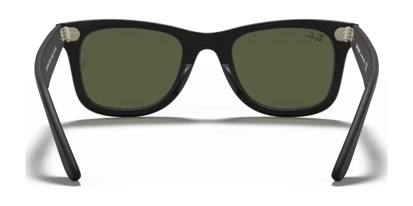 Back view of Ray-Ban WAYFARER RB2140F sunglasses with black frames and green-tinted lenses offering UV protection, set against a white background.