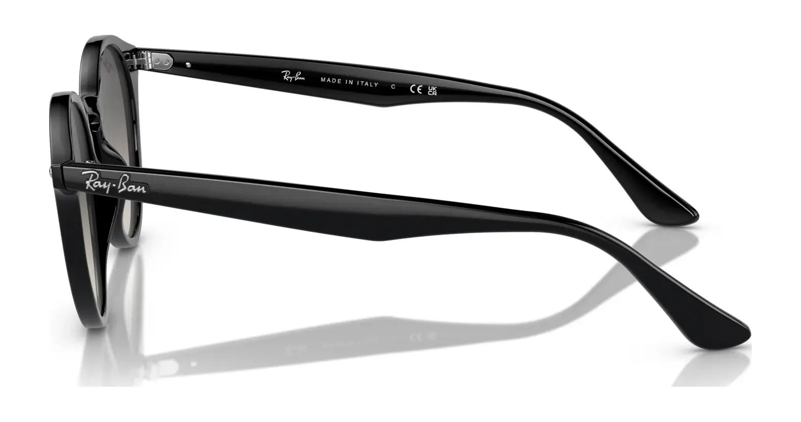 A side view of Ray-Ban RB2180F Sunglasses, size 49, in black and oval-shaped, showcasing the logo on the temples. They elegantly reflect on a white surface while providing superior UV protection.