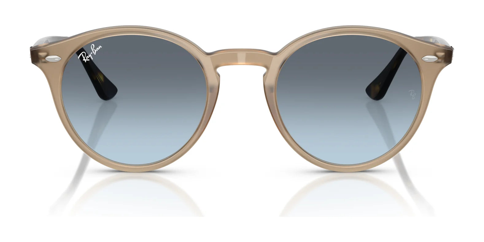 Discover the chic allure of Ray-Ban RB2180F Sunglasses, featuring beige frames and blue gradient lenses. Their stylish oval shape offers optimal UV protection while adding a timeless touch to your look.