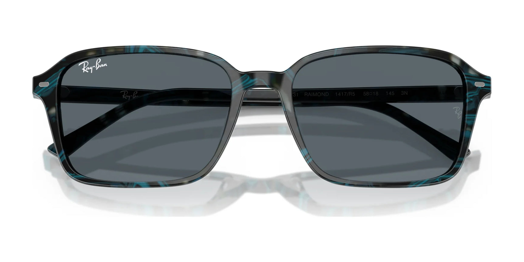 Ray-Ban RAIMOND RB2231 sunglasses have polarized dark lenses and thin, patterned blue frames for a stylish edge.