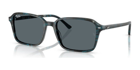 The Ray-Ban RAIMOND RB2231F Sunglasses, size 56, feature a timeless rectangular design with dark lenses and striped blue frames, showcasing superior quality.