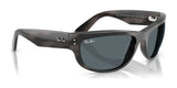 The Ray-Ban MEGA BALORAMA RB2289 sunglasses showcase a sporty design with gray frames and dark, polarized lenses, viewed from the side.