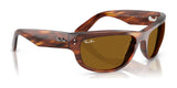 The Ray-Ban MEGA BALORAMA RB2289 sunglasses boast a sporty design with tortoiseshell frames, brown polarized lenses, and the iconic "Ray-Ban" logo elegantly stamped on both the temples and lens.