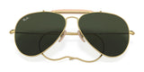 Ray-Ban OUTDOORSMAN I RB3030 Sunglasses with polarized dark green lenses and sleek gold metal frames, set against a pristine white background.