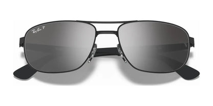 A pair of stylish Ray-Ban RB3528 sunglasses, size 61, featuring dark lenses and a double bridge, providing ultimate UV protection.