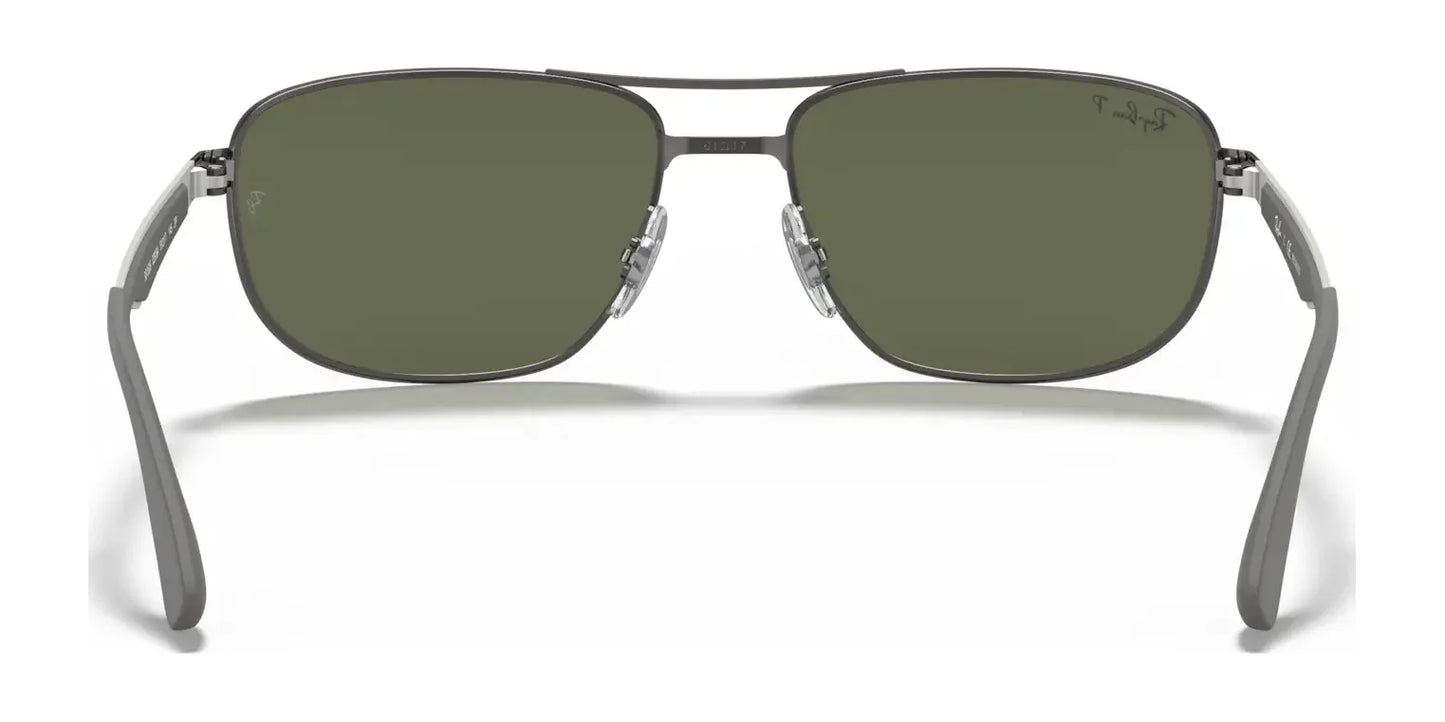 Front view of the stylish Ray-Ban RB3528 Sunglasses featuring dark green lenses and a sleek gray metal frame, offering Ray-Ban's classic appeal and essential UV protection in size 61.