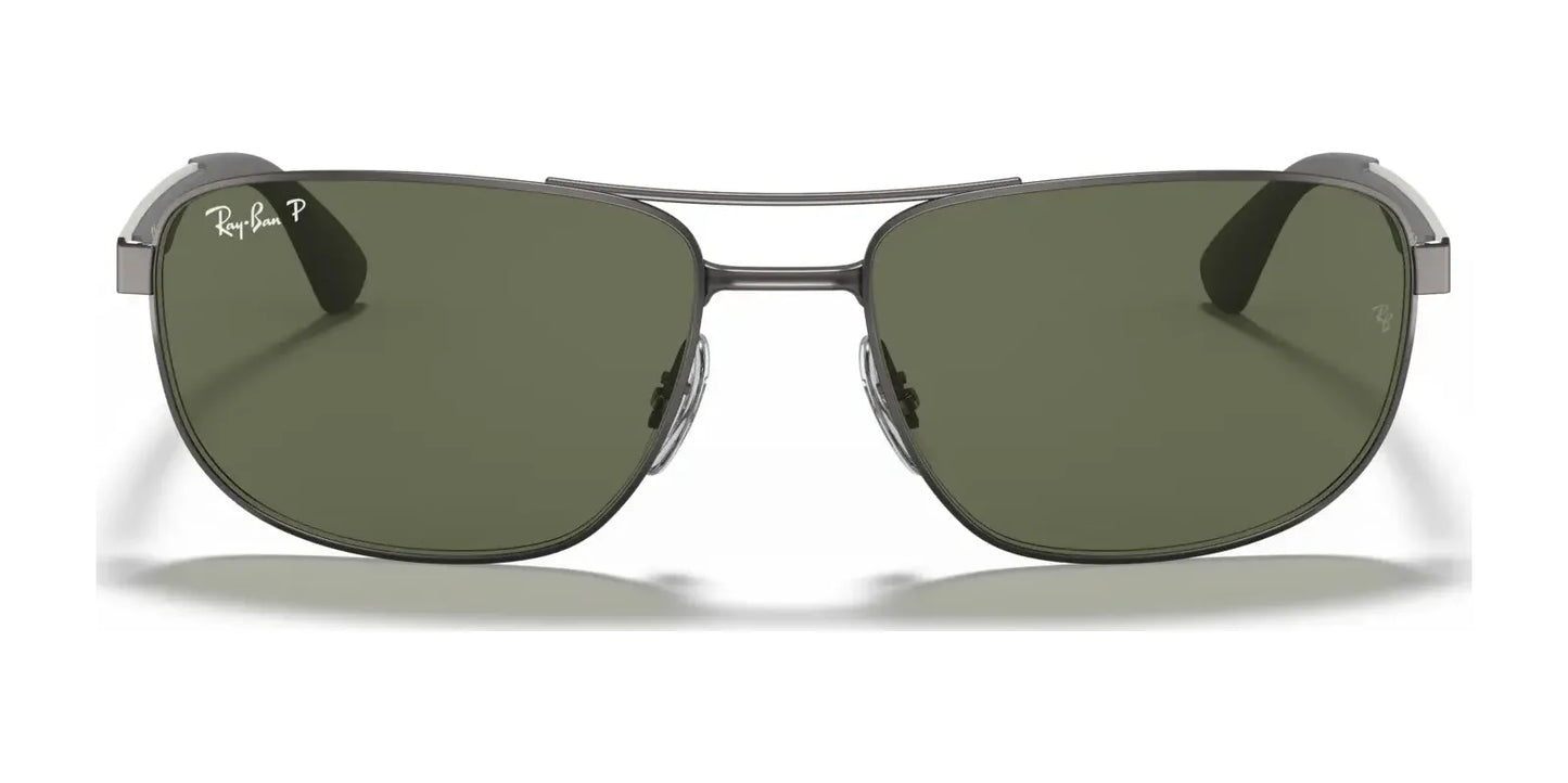 Sporting a pair of Ray-Ban RB3528 sunglasses in size 61, these stylish sunnies come with dark green lenses and a silver frame, offering excellent UV protection for your eyes.