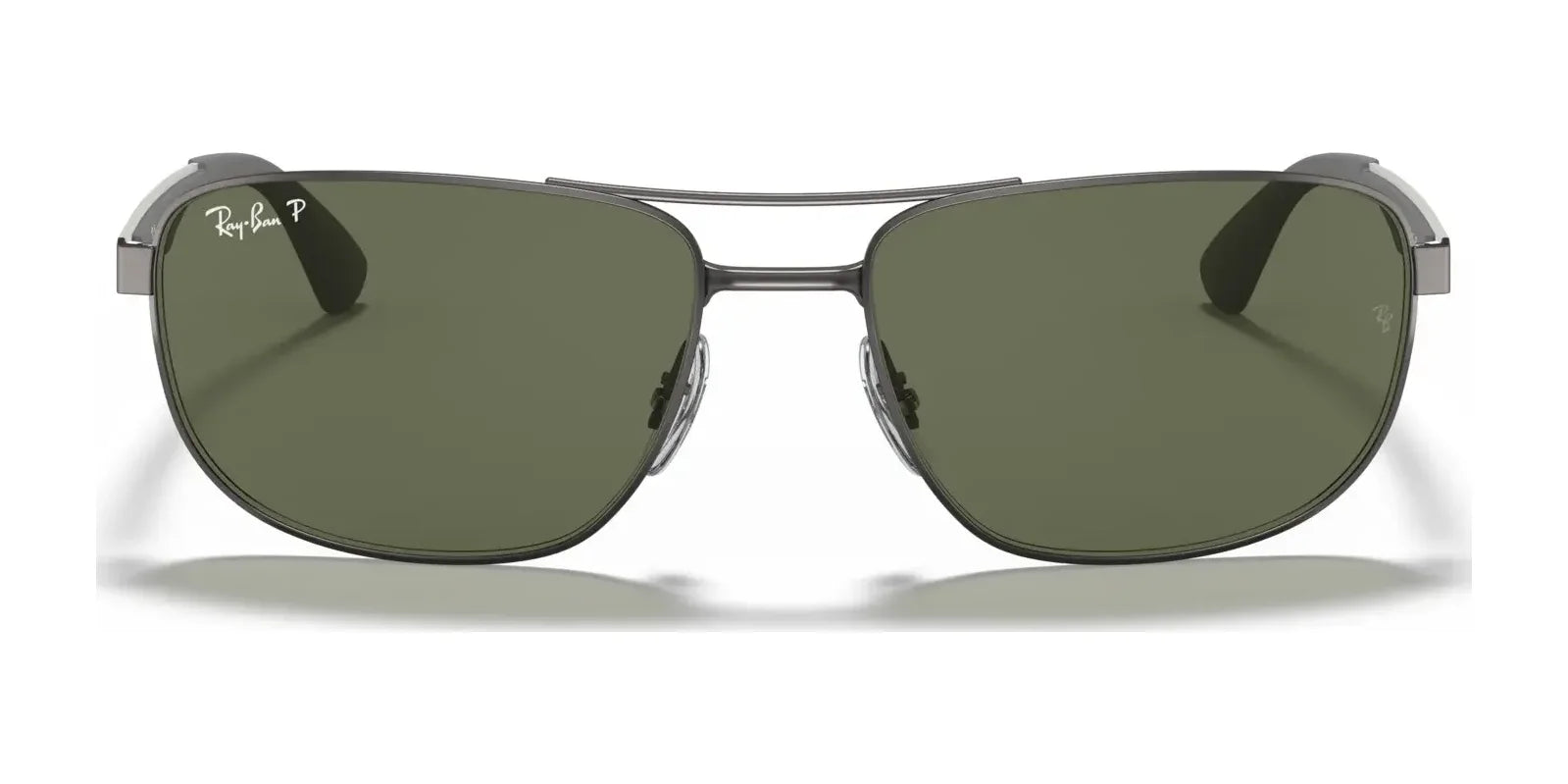 Sporting a pair of Ray-Ban RB3528 sunglasses in size 61, these stylish sunnies come with dark green lenses and a silver frame, offering excellent UV protection for your eyes.