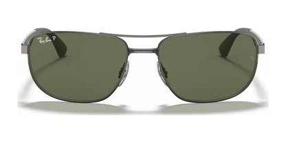 Sporting a pair of Ray-Ban RB3528 sunglasses in size 61, these stylish sunnies come with dark green lenses and a silver frame, offering excellent UV protection for your eyes.