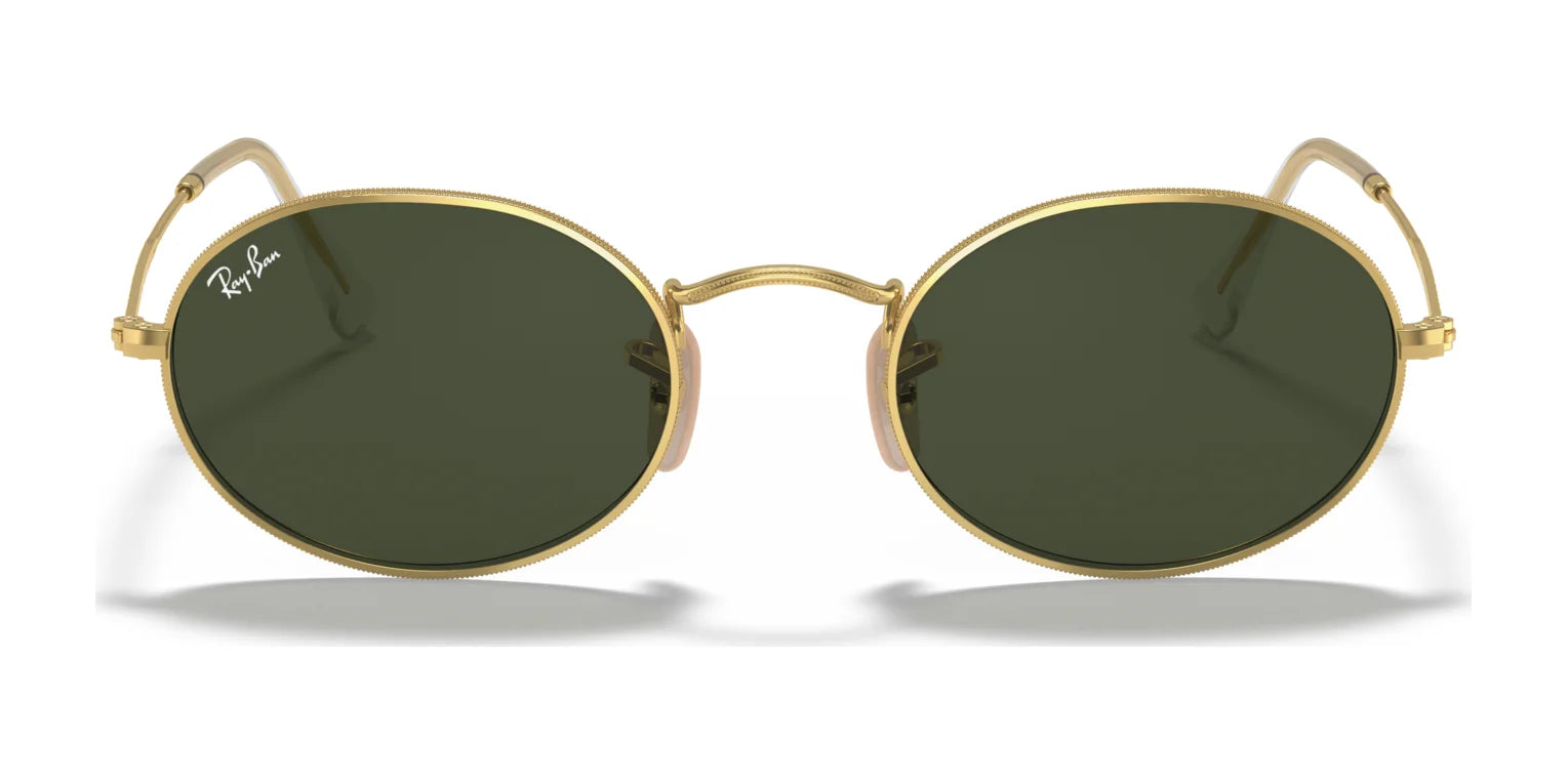 Ray-Ban OVAL RB3547 sunglasses, featuring a gold frame with dark green lenses, are displayed on a white background.