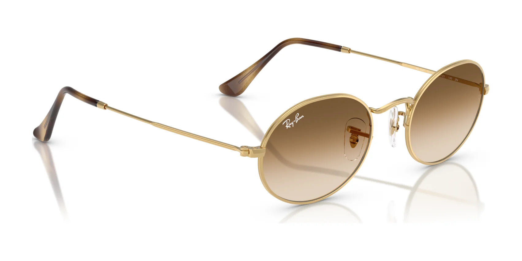 Round Ray-Ban OVAL RB3547 sunglasses with gold rims, premium materials, brown gradient lenses, and brown temple tips.