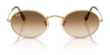 Ray-Ban OVAL RB3547 Sunglasses feature round gold frames and brown gradient lenses, crafted from premium materials, showcased on a white background.