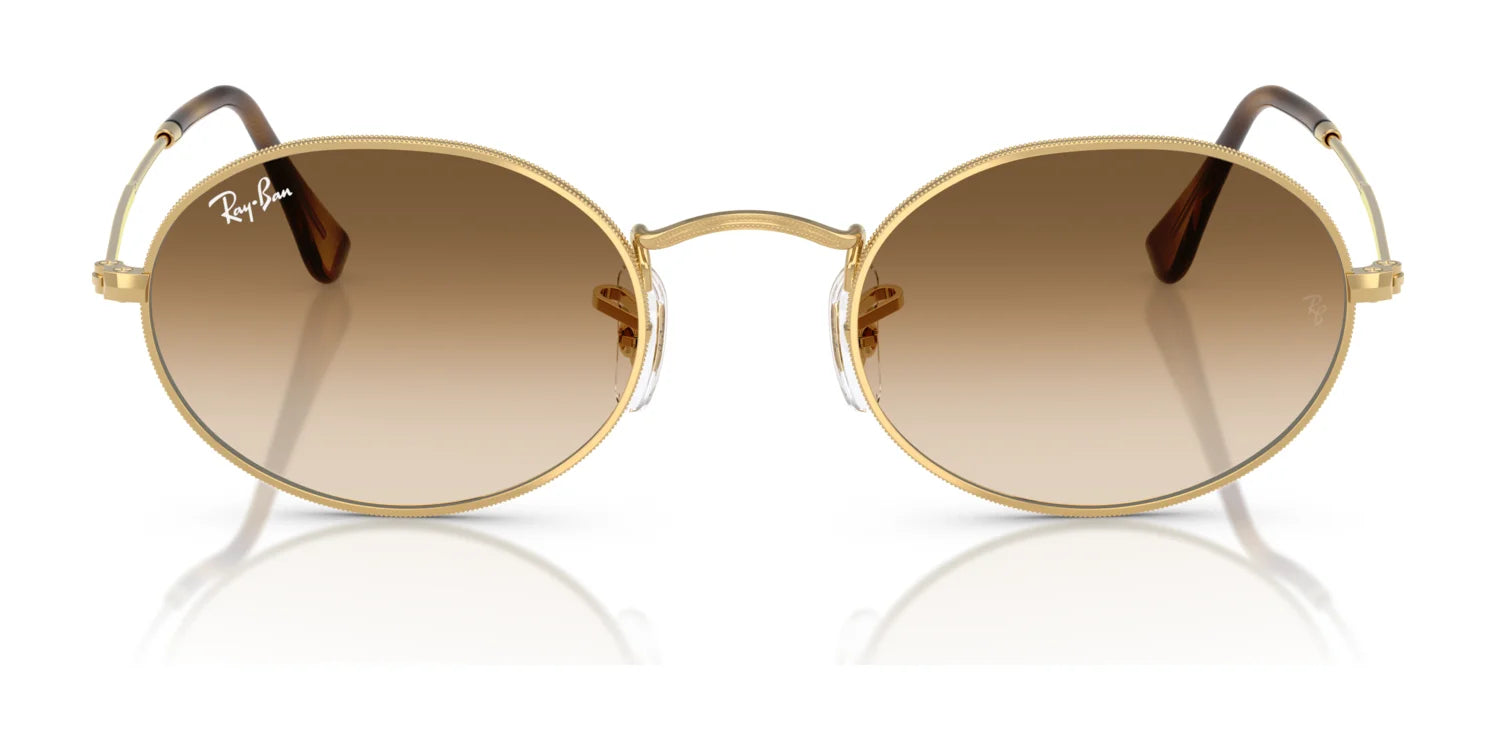 Ray-Ban OVAL RB3547 Sunglasses feature round gold frames and brown gradient lenses, crafted from premium materials, showcased on a white background.