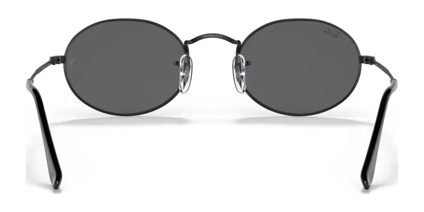 Ray-Ban OVAL RB3547 Sunglasses feature round black lenses, oval frames, and thin metal arms, crafted from premium materials.