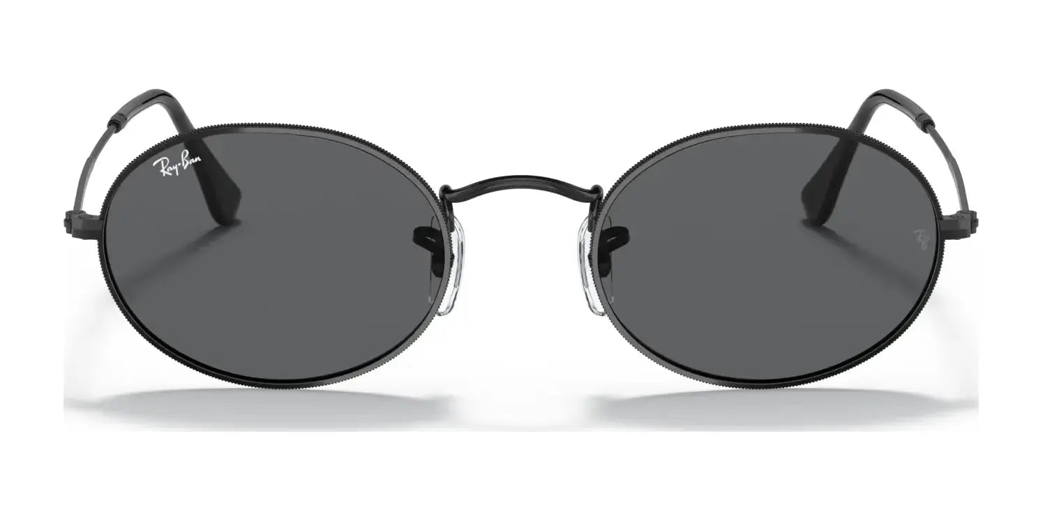 The Ray-Ban OVAL RB3547 Sunglasses, featuring dark lenses and thin frames, are displayed on a white background, highlighting premium materials for elegance.