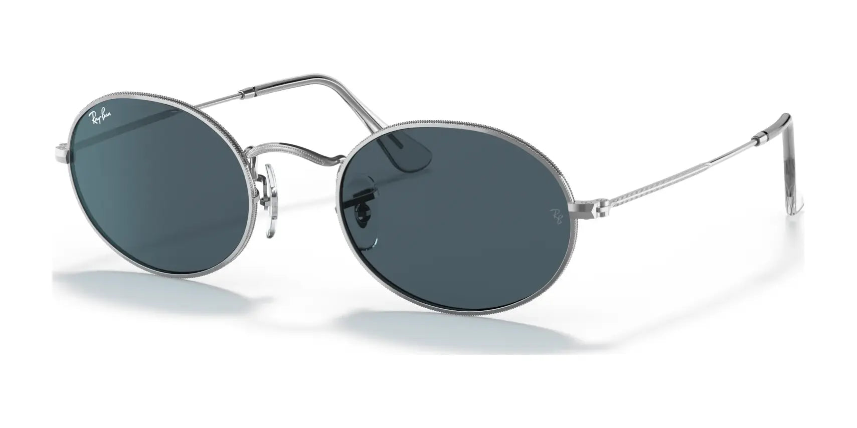 With their oval frames, dark lenses, and thin silver arms, the Ray-Ban OVAL RB3547 Sunglasses offer a sleek style using premium materials for a classic Ray-Ban look.