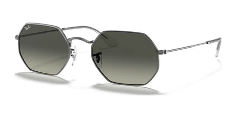 Ray-Ban OCTAGONAL RB3556N Sunglasses, size 53, feature thin metal frames and dark lenses for UV protection, showcasing a sleek octagonal shape from the side view.