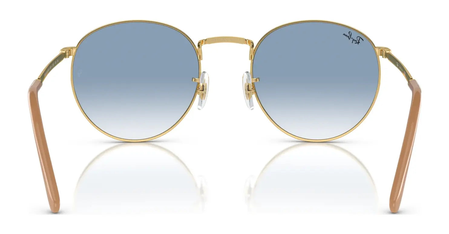 The Ray-Ban NEW ROUND RB3637 sunglasses feature round gold frames with premium engravings on the bridge, stylish blue gradient crystal lenses, and light brown arms.