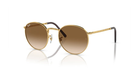 Ray-Ban NEW ROUND RB3637 sunglasses with a gold rim and brown gradient lenses elegantly rest on a white background.