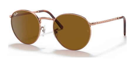 Explore the Ray-Ban NEW ROUND RB3637 Sunglasses, featuring a sleek design with brown lenses and thin gold frames.