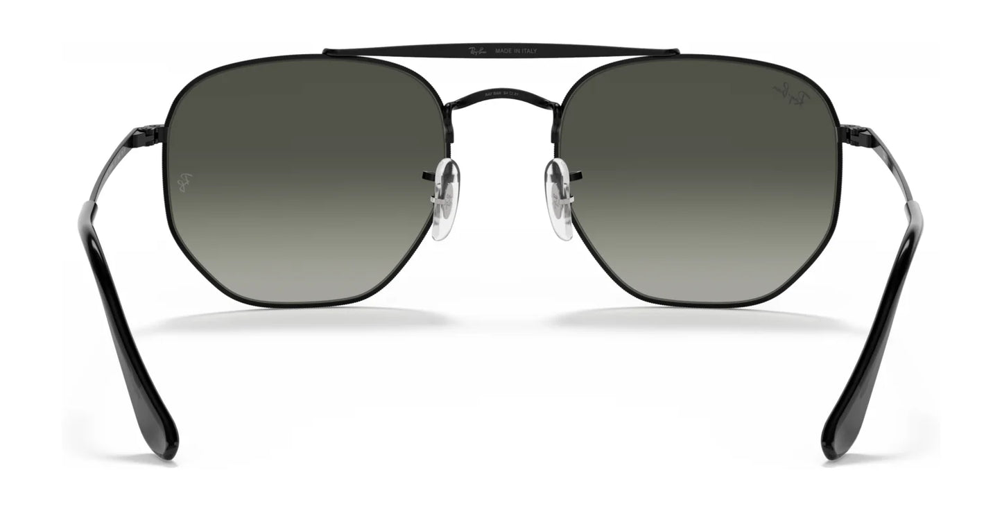 The Ray-Ban THE MARSHAL RB3648 Sunglasses (Size 54) feature black geometric frames with high-quality dark tinted lenses, complemented by thin metal arms and nose pads, inspired by Ray-Ban's iconic style.