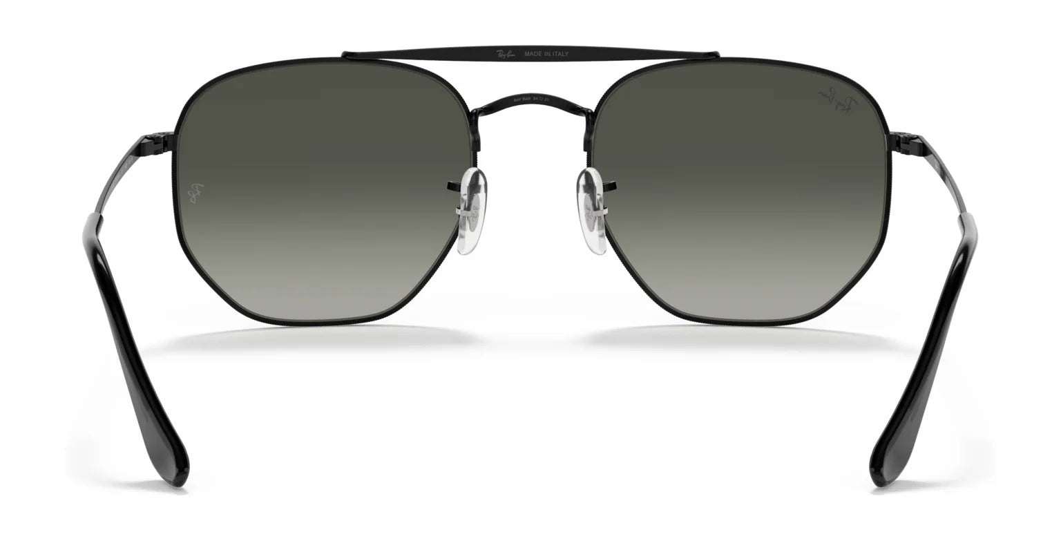 The Ray-Ban THE MARSHAL RB3648 Sunglasses (Size 54) feature black geometric frames with high-quality dark tinted lenses, complemented by thin metal arms and nose pads, inspired by Ray-Ban's iconic style.