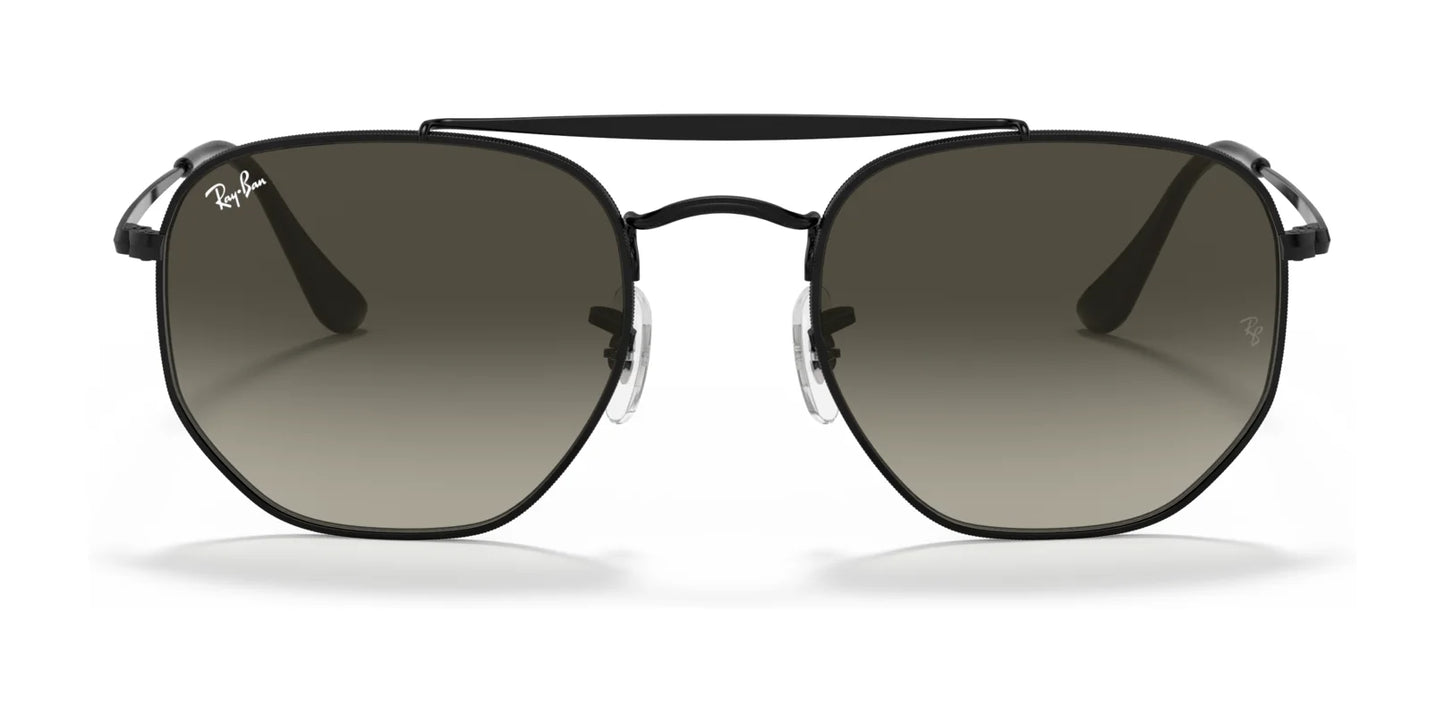 The Ray-Ban THE MARSHAL RB3648 Sunglasses in Size 54 feature a hexagonal black frame with high-quality dark lenses and a thin top bar, showcasing the Ray-Ban logo on the top left lens.