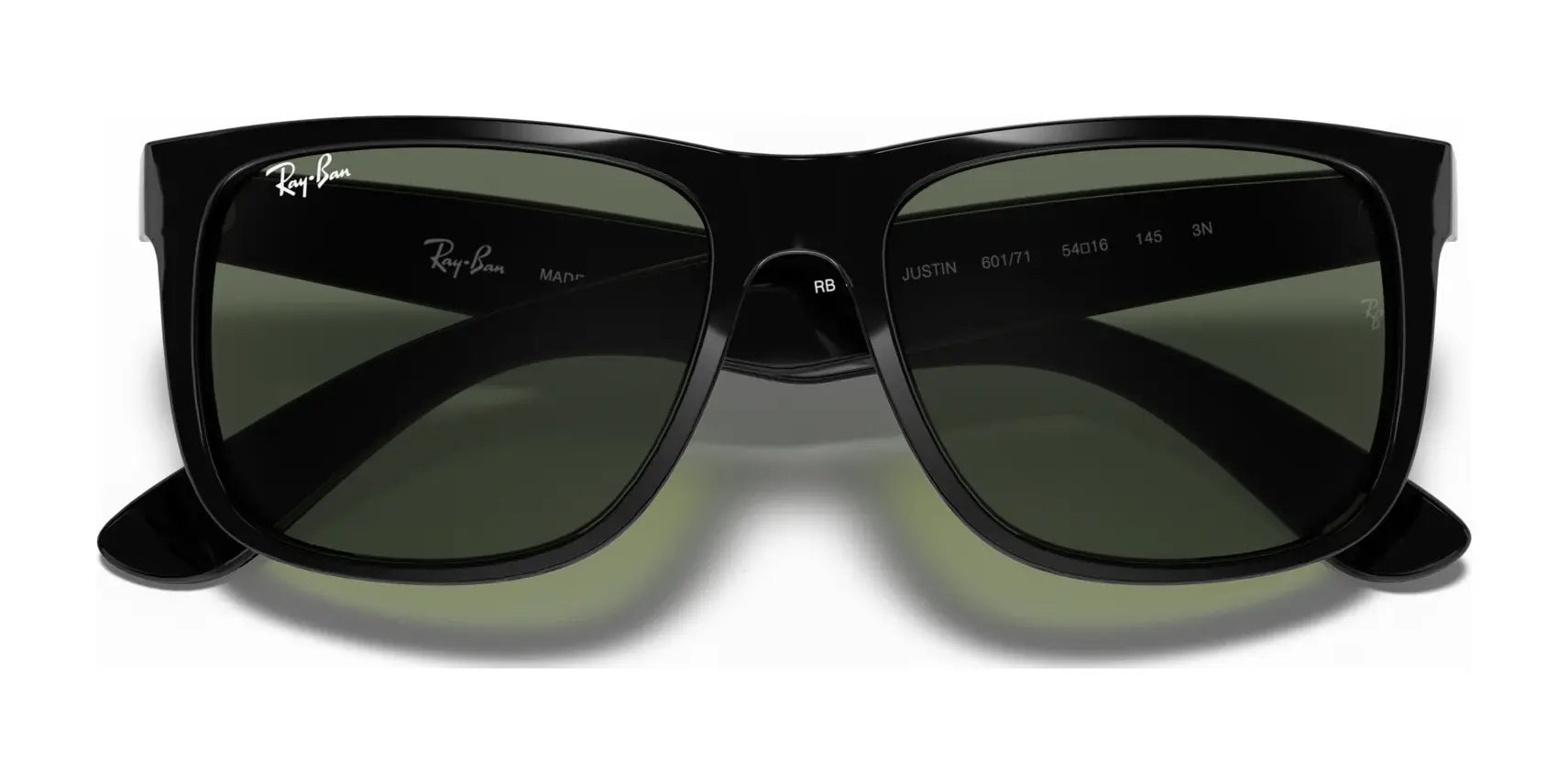 The Ray-Ban JUSTIN RB4165 sunglasses feature bold square black frames with dark green lenses, offer 100% UV protection, and sport a sleek white logo on the top left corner for added style.