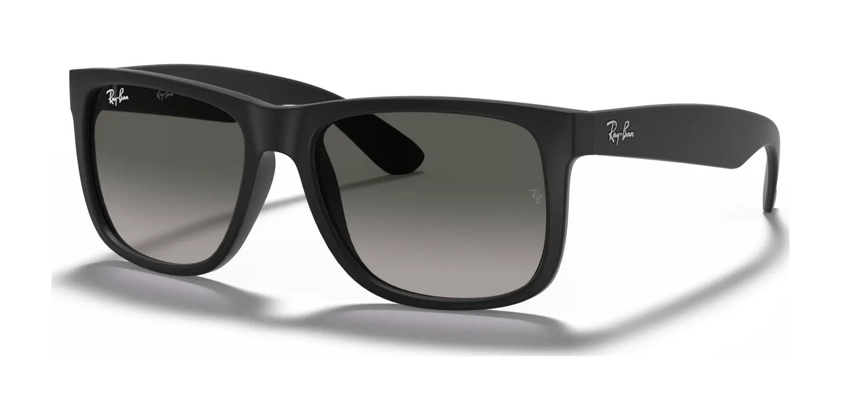 The Ray-Ban JUSTIN RB4165 sunglasses in Rubber Black №601/8G offer 100% UV protection with dark gradient lenses. Their sleek design is highlighted by a logo on the top corner of the right lens and temple.