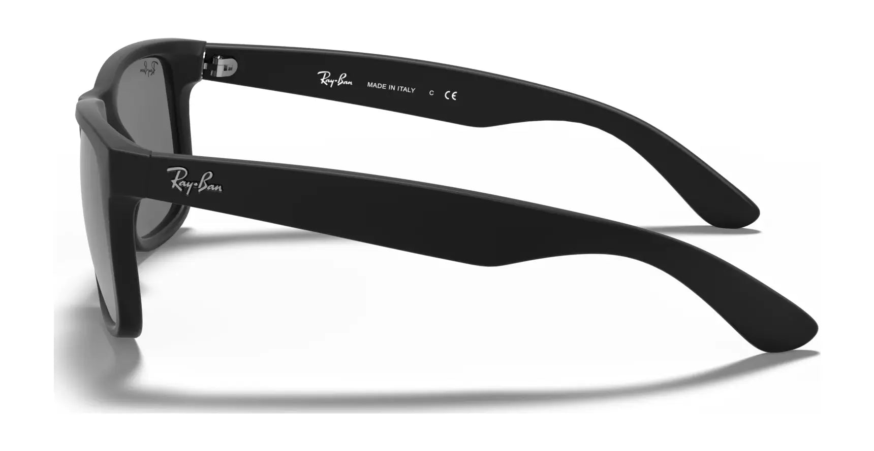 A side view of the Ray-Ban JUSTIN RB4165 sunglasses in black displays the iconic logos on the temple and arm. These square-shaped sunglasses combine style with functionality, offering 100% UV protection.